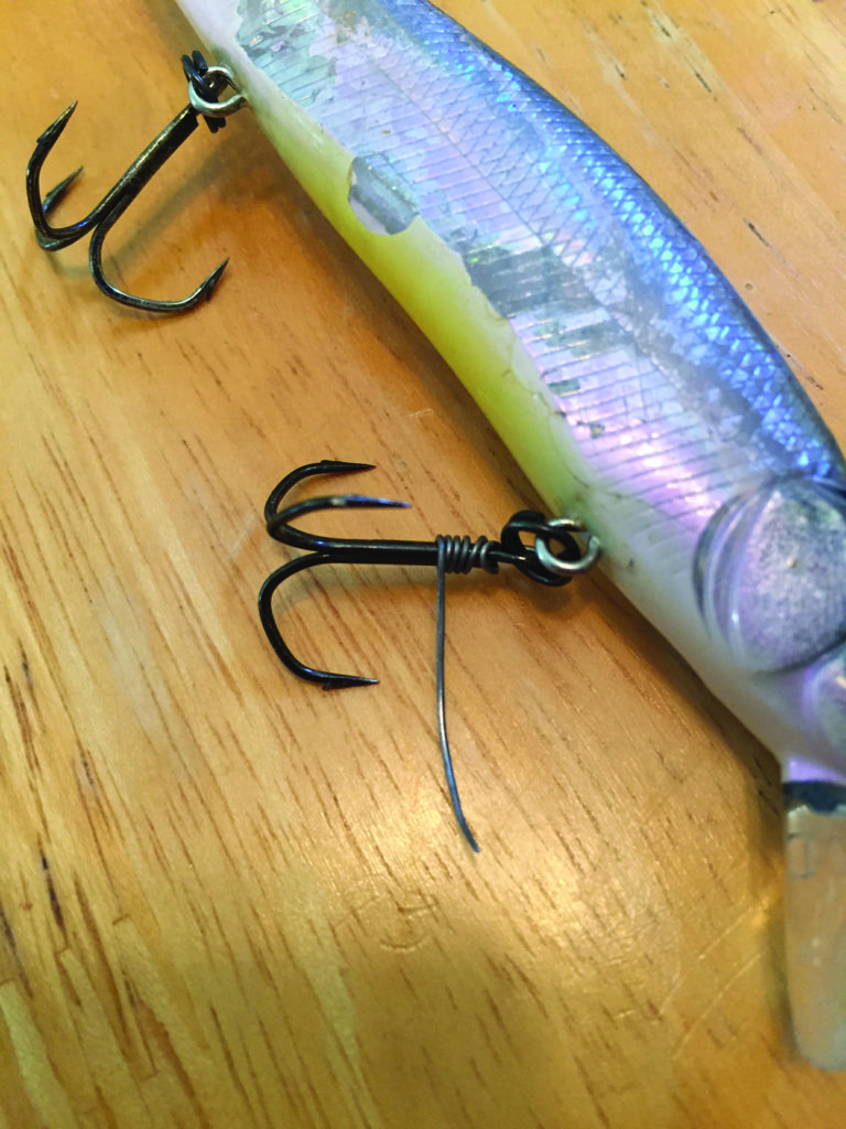 I've been taking more crank/jerk baits on the kayak lately and the treble  hooks are painful (literally) to deal with. I've seen people use small rubber  bands to connect the hooks while